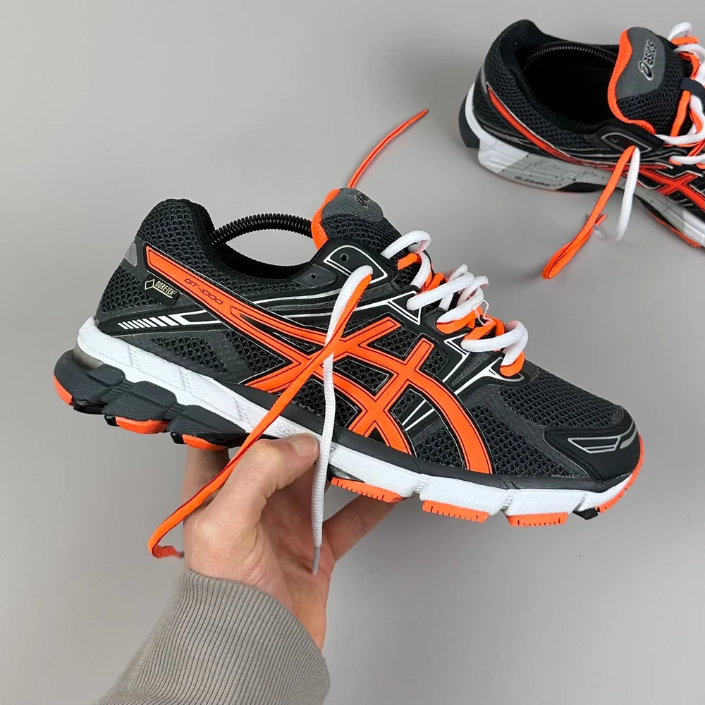 GEL Nimbus 16 — Anthracite / Orange vif