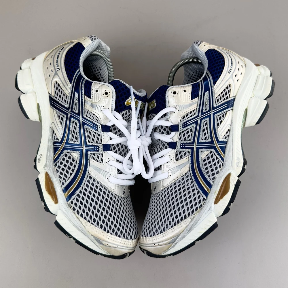 GEL Nimbus 16 — Crème / Marine / Doré