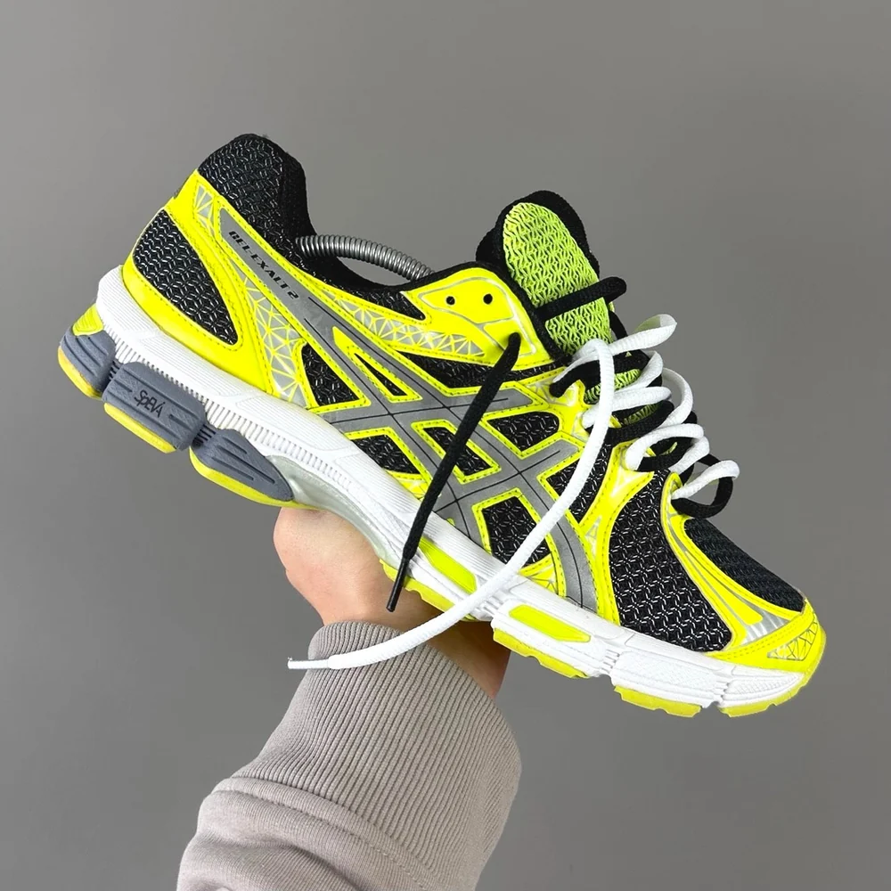 GEL Nimbus 16 — Jaune fluo / Noir / Gris