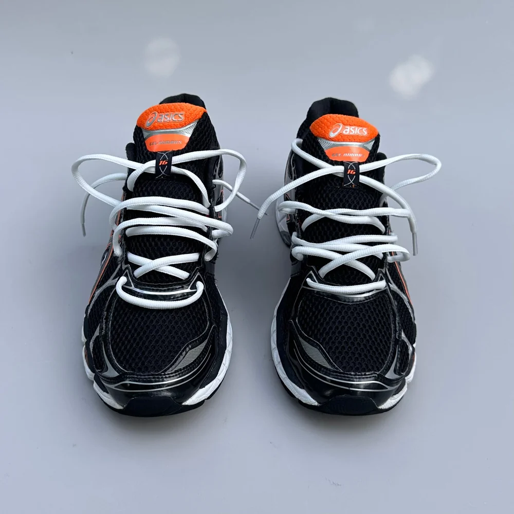GEL Nimbus 16 — Noir / Orange / Argent