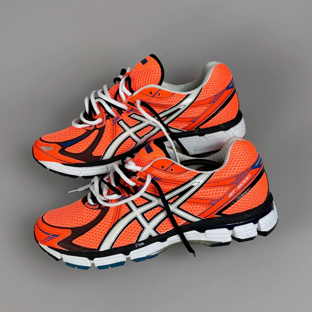GEL Nimbus 16 — Orange / Blanc