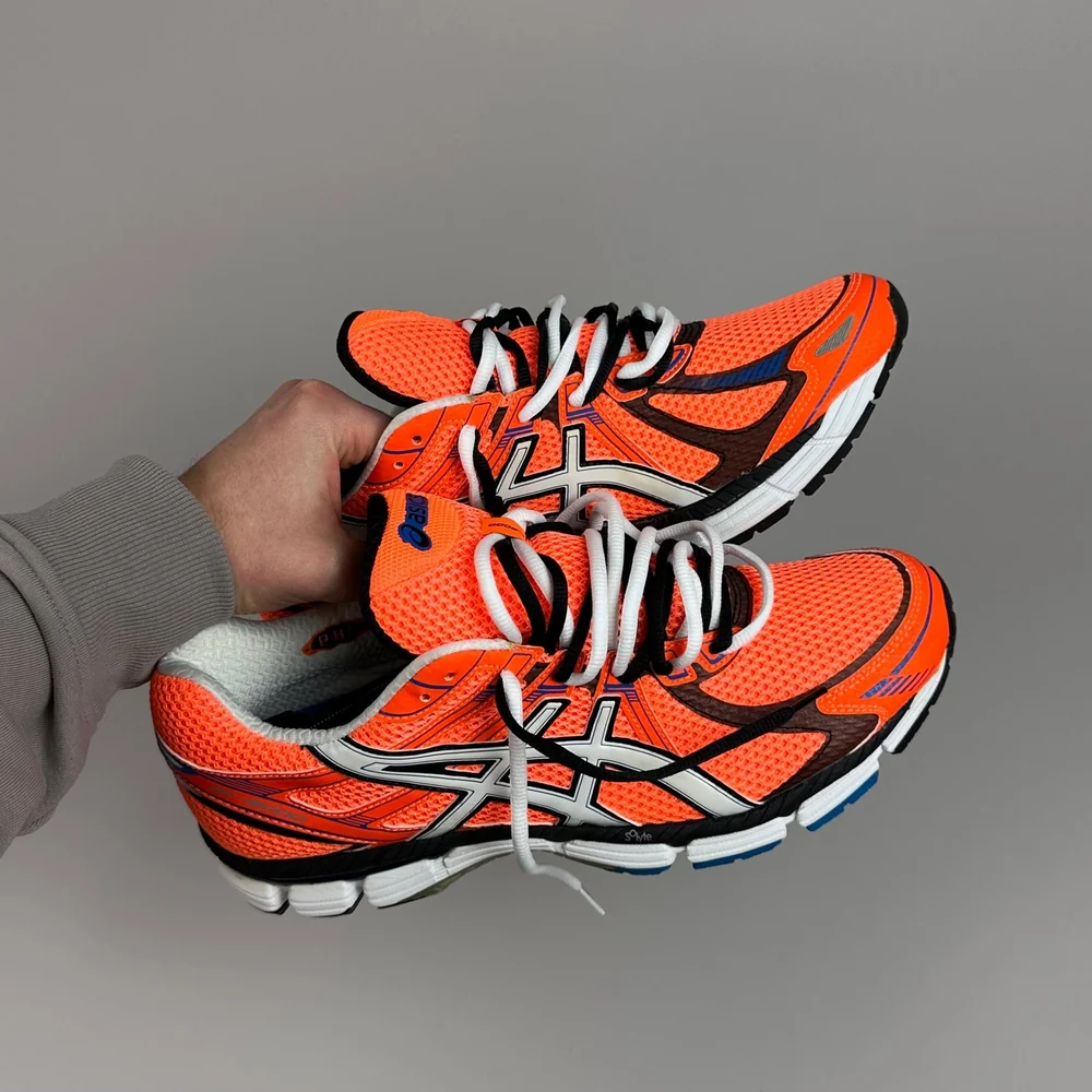 GEL Nimbus 16 — Orange / Blanc